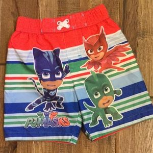 Lil guy swim trunks.